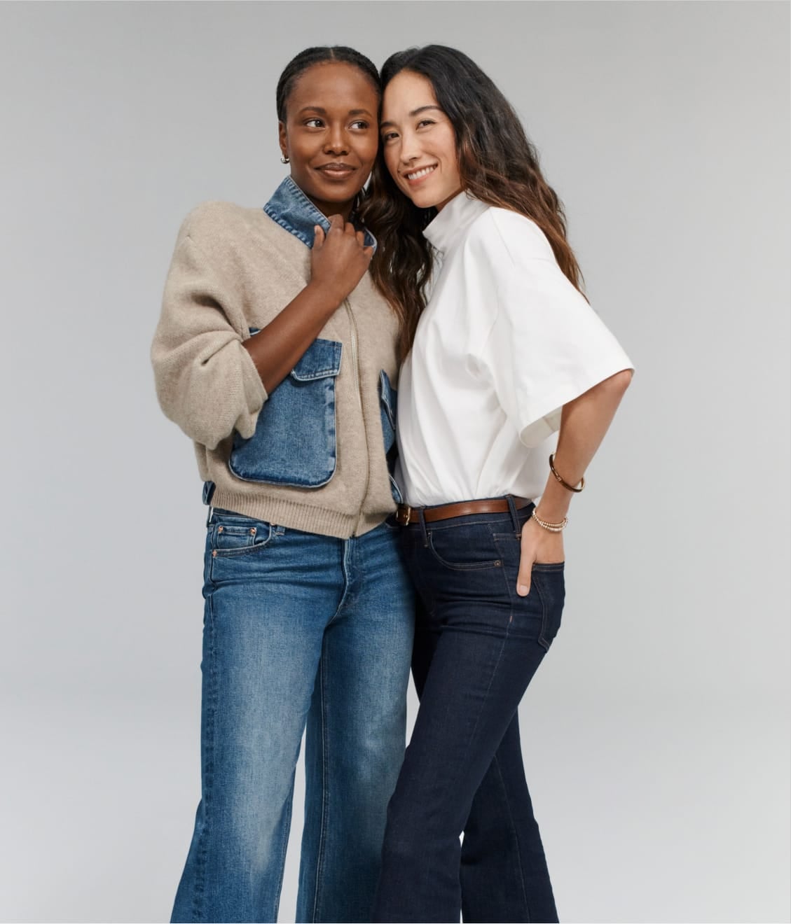 Two models wearing denim and layered fall outfits from EVEREVE