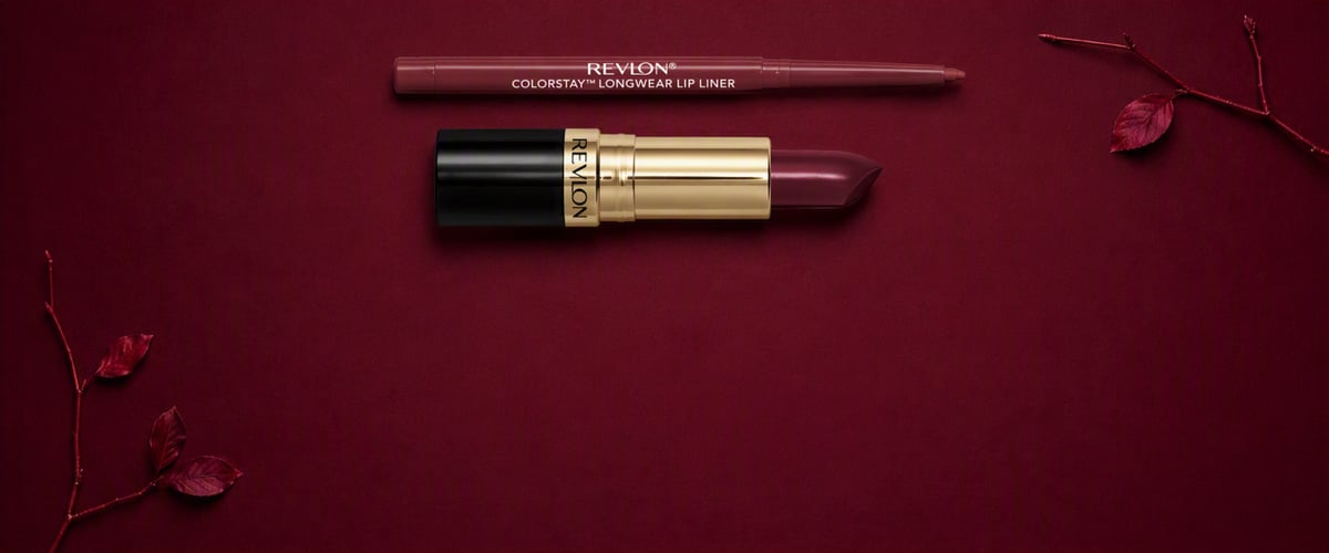 Revlon lipstick and lip liner on a deep burgundy background